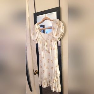 White floral puffy sleeve dress with ruffled bottom